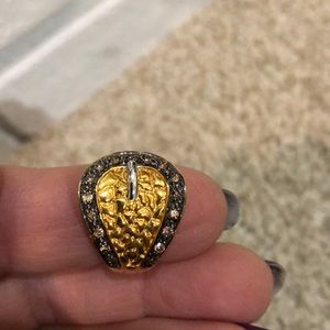 Gold colored 925 Buckle ring.